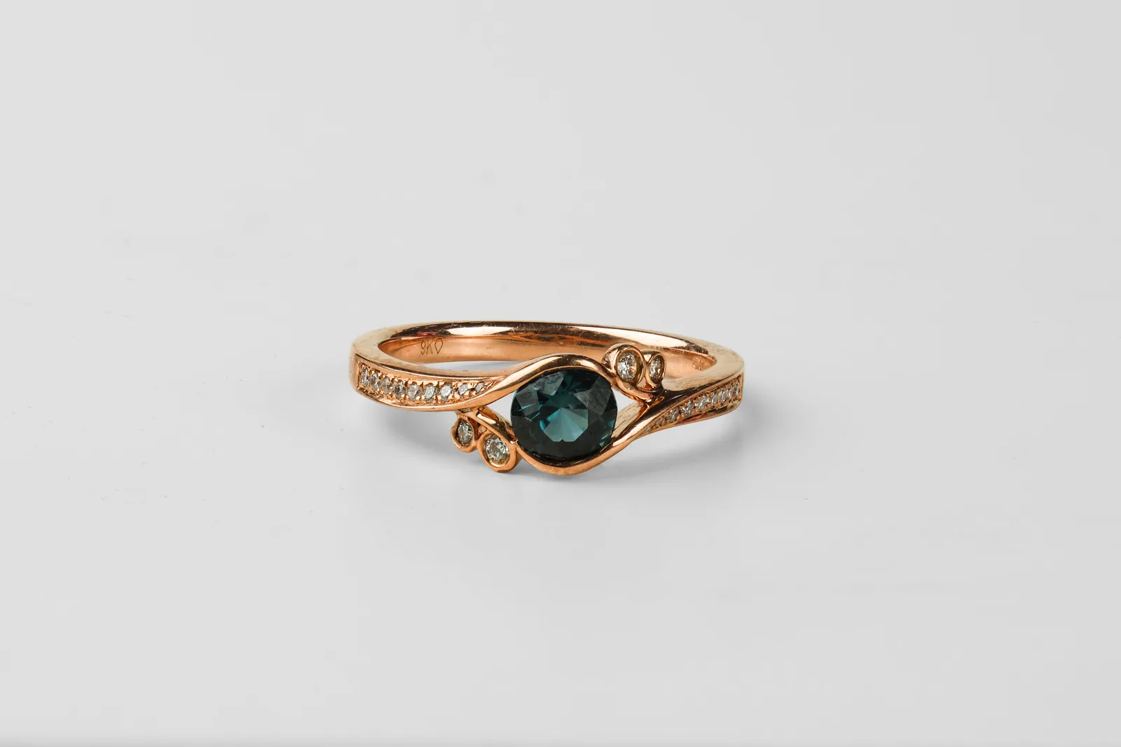 Teal Sapphire Solitaire Ring in 9ct Rose Gold