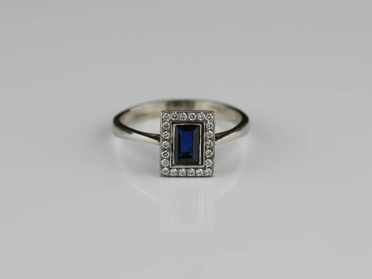 Sapphire & Diamond Halo Ring in 18ct White Gold