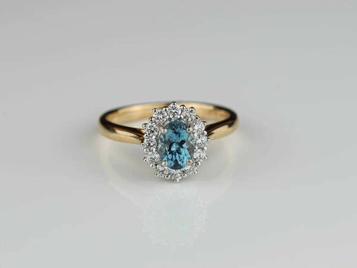 Aquamarine & Diamond Halo Ring in 18ct Yellow Gold