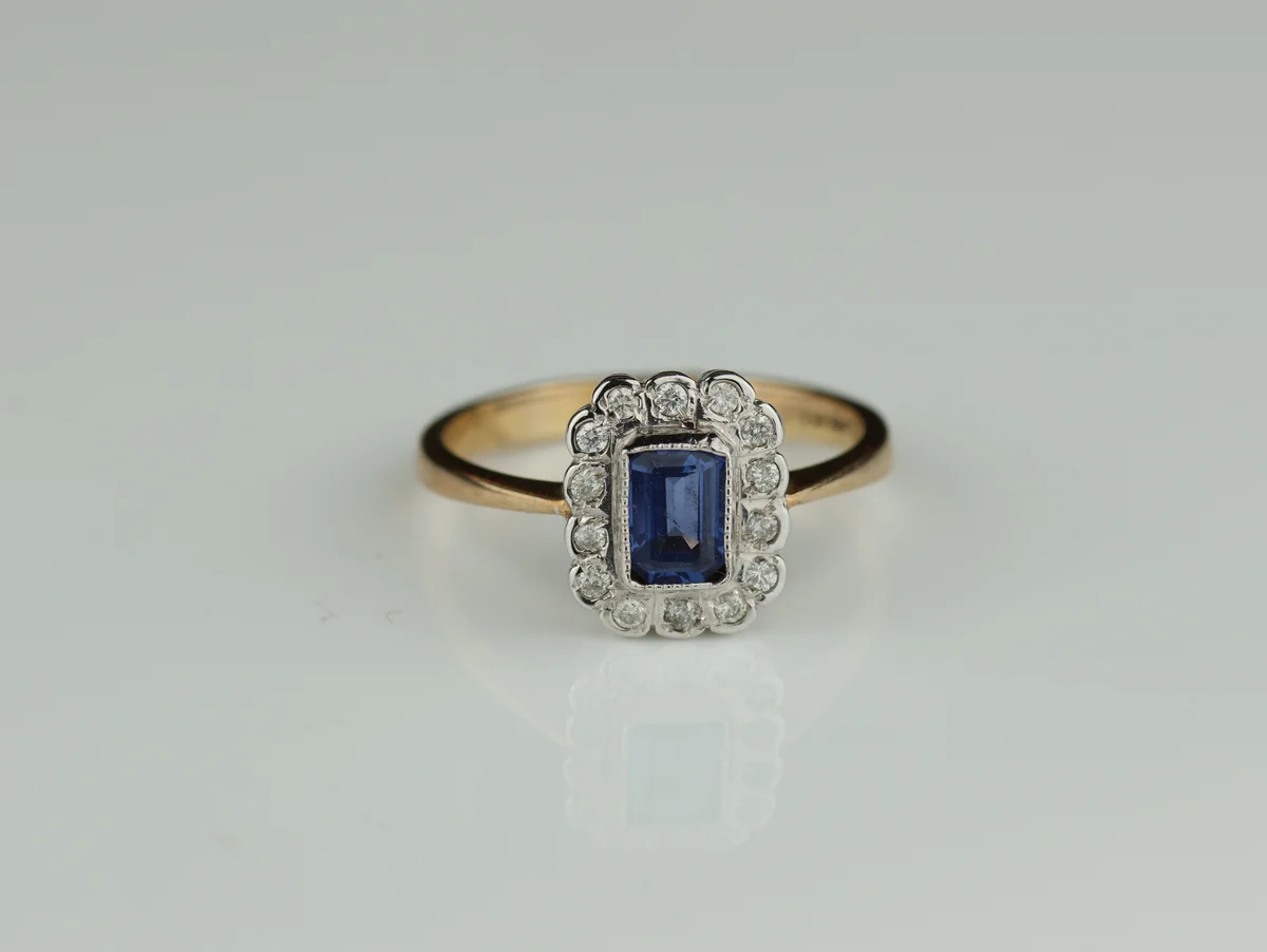 Sapphire & Diamond Halo Ring in 9ct Yellow Gold