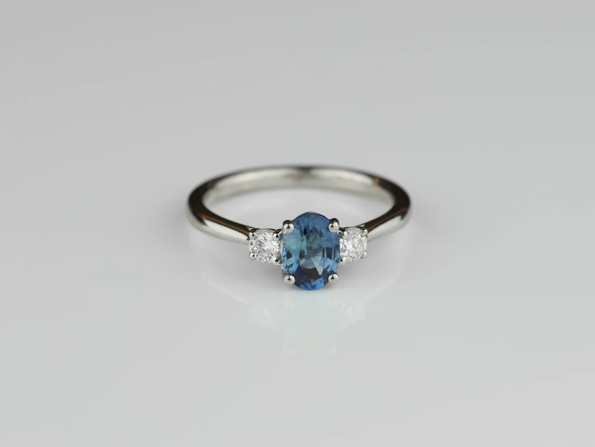 Oval Sapphire & Diamond Three Stone Ring in Platinum