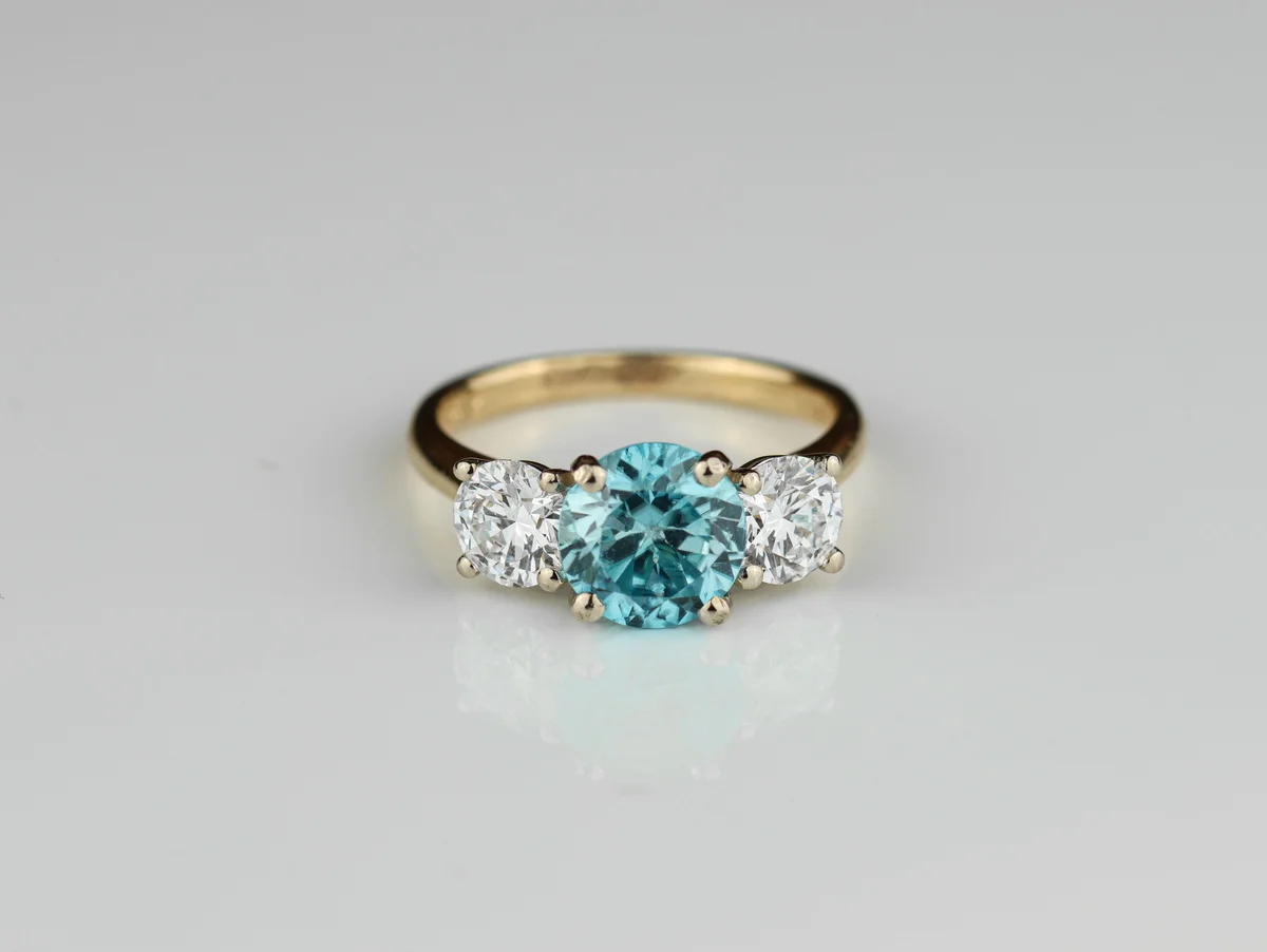 Blue Zircon & Lab-Grown Diamond Halo Ring in 18ct White Gold