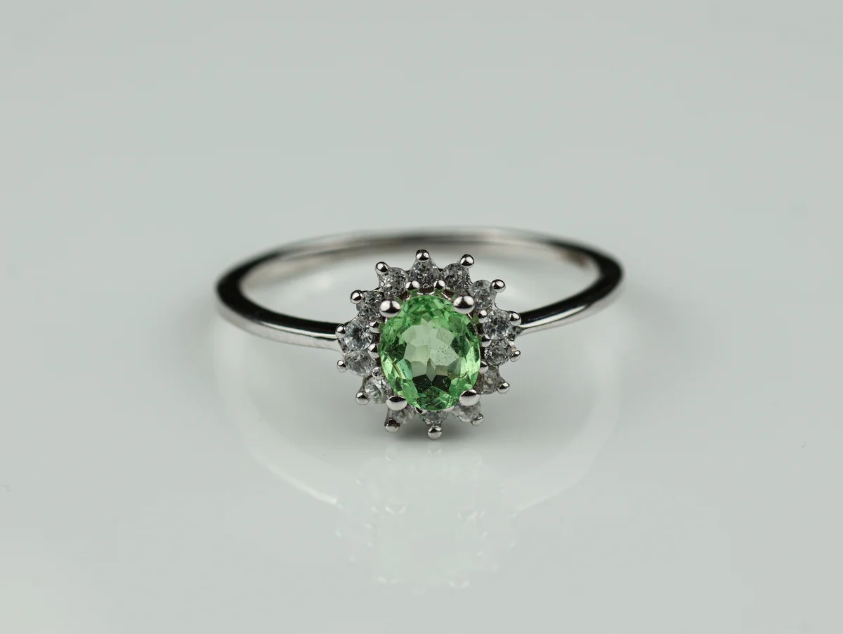 Peridot Halo Ring in 9ct White Gold