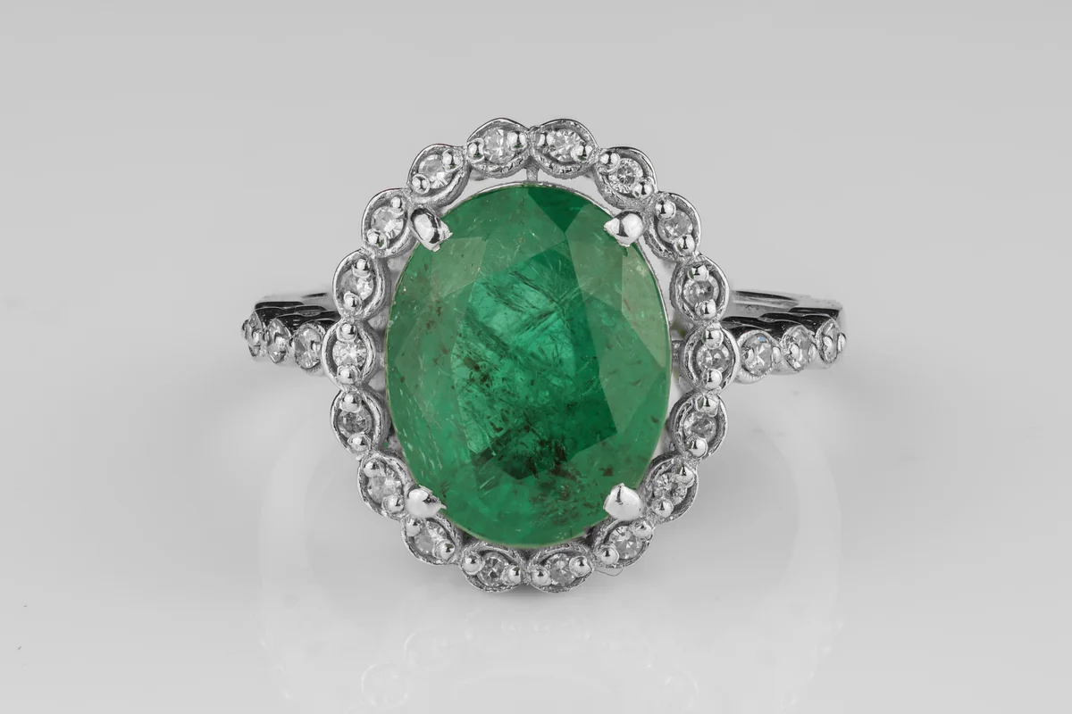 Emerald Halo Ring in 18ct White Gold