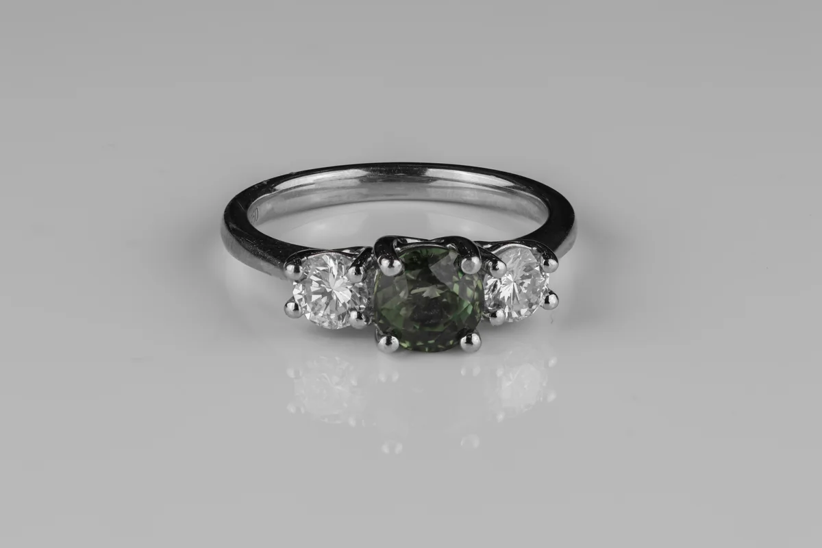 Teal Sapphire Trilogy Ring in Platinum