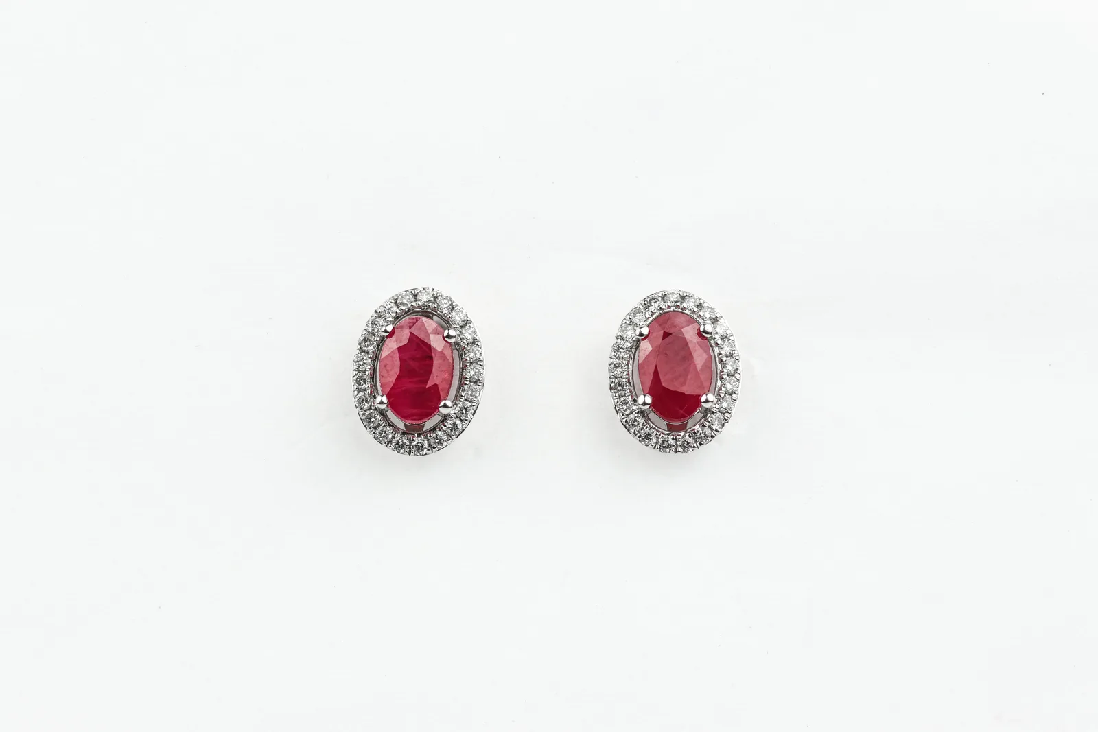 Ruby Stud Halo Earrings in 9ct White Gold