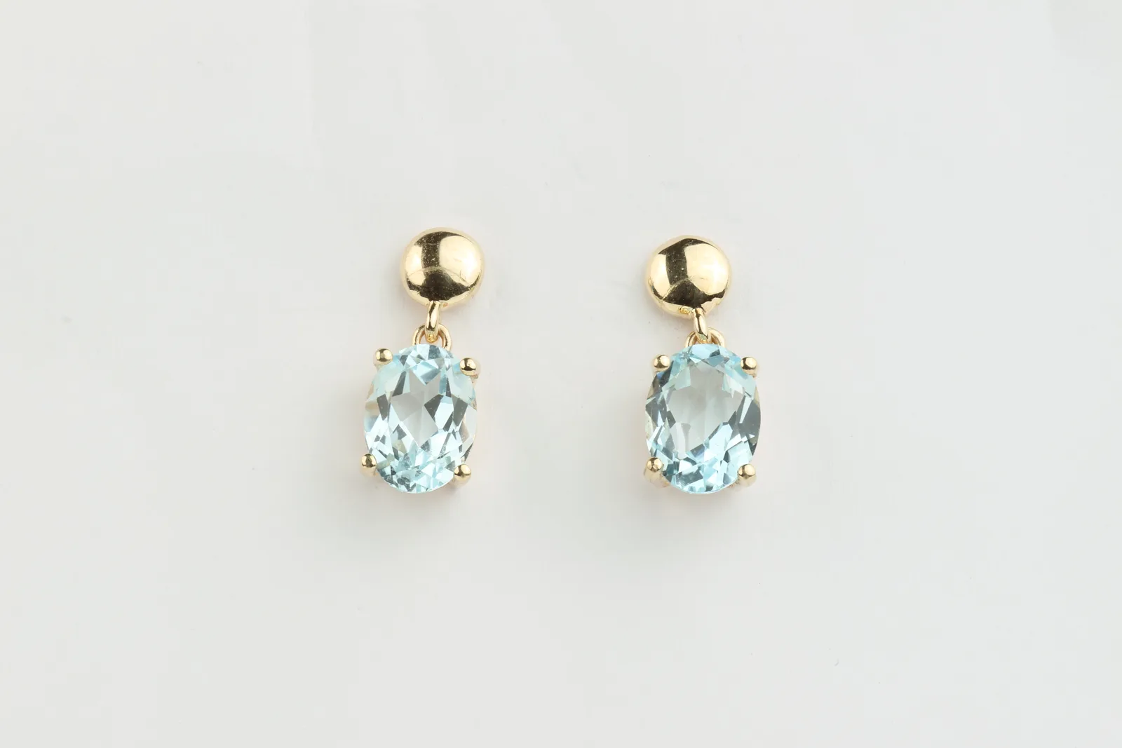 Blue Topaz Drop Earrings in 9ct Yellow Gold