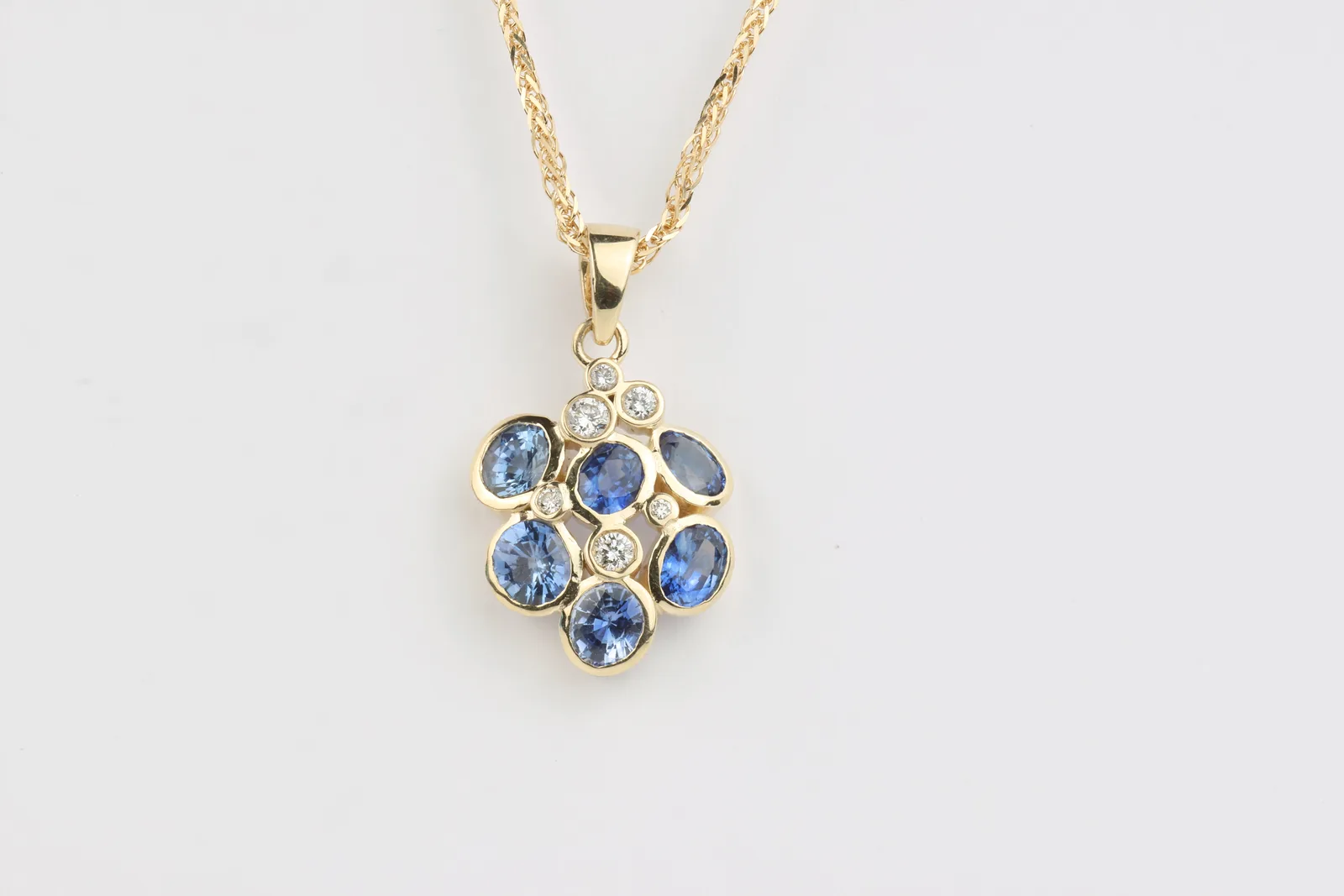 Sapphire Cluster Pendant in 9ct Yellow Gold
